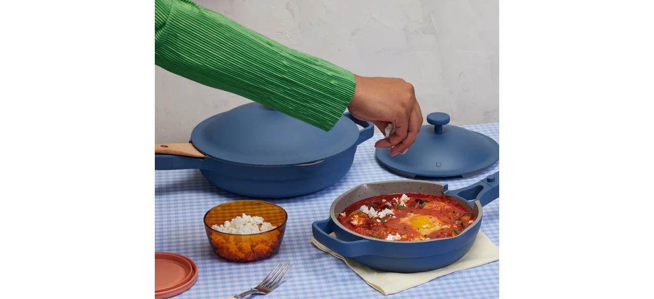 Blue Our Place Cookware Set on table