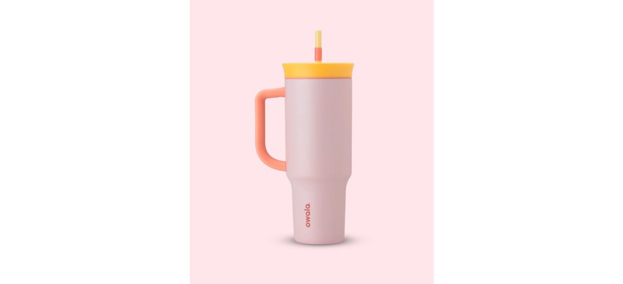 Pink and yellow Owala 40oz Tumbler on pink background