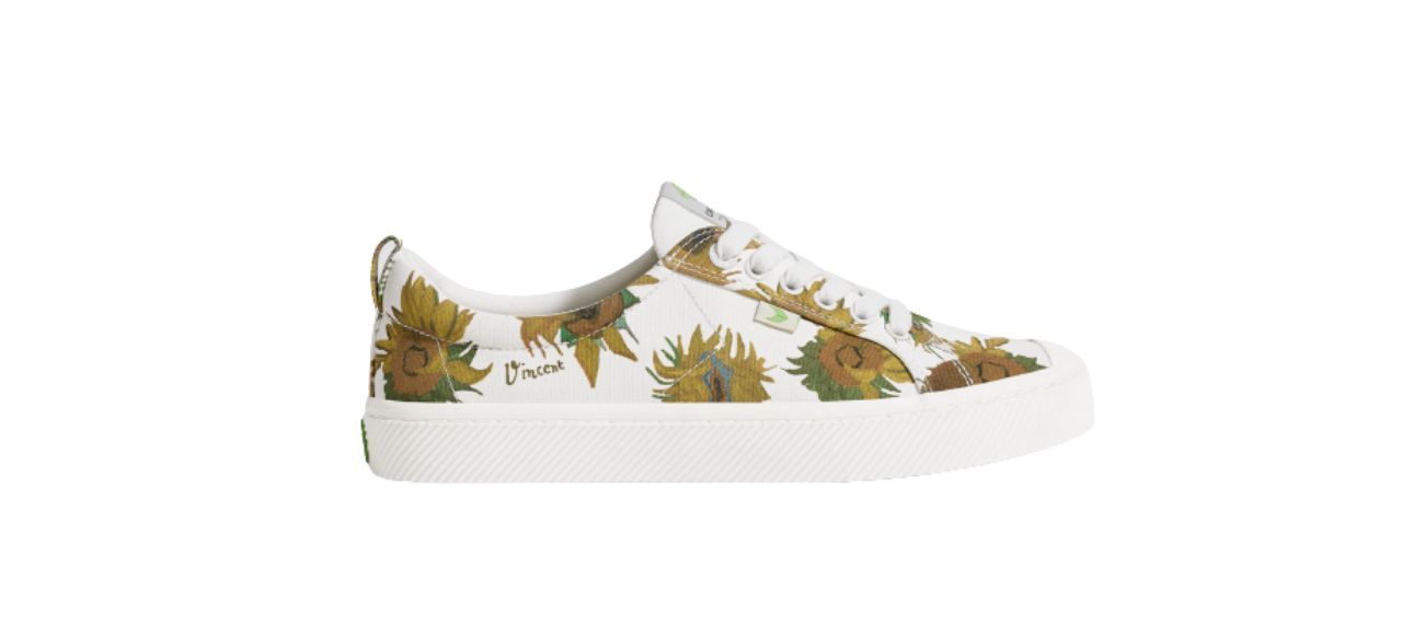 off-white canvas sneakers with sunflowers on them