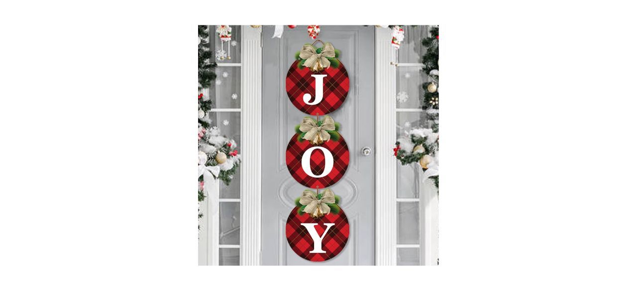 OuMuaMua Buffalo Plaid Christmas Wreath 3-piece Door Hanger, making up a 3-piece red sign that spells out "joy"