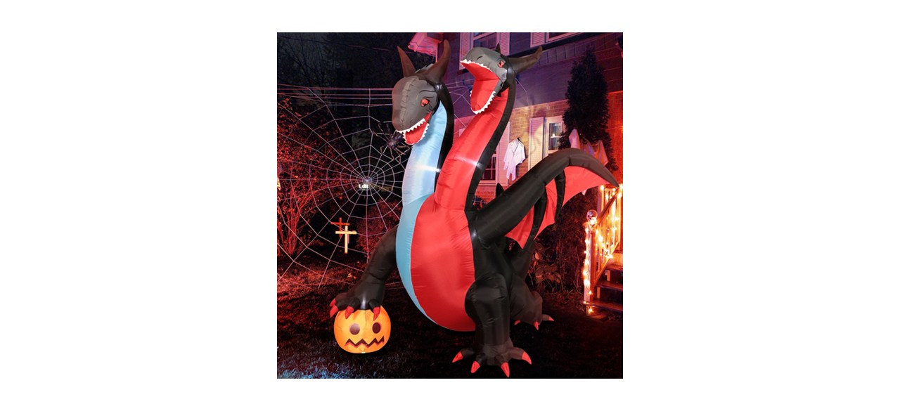 A black, red and white two-headed inflatable dragon yard decoration.