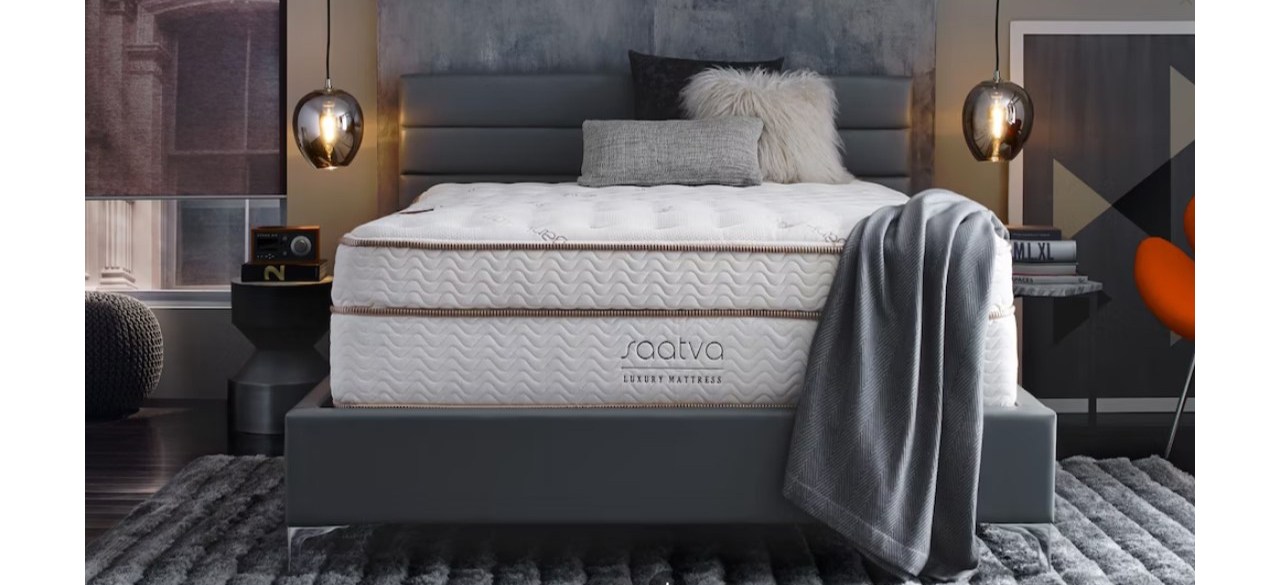 Saatva Classic Mattress in gray and tan bedroom