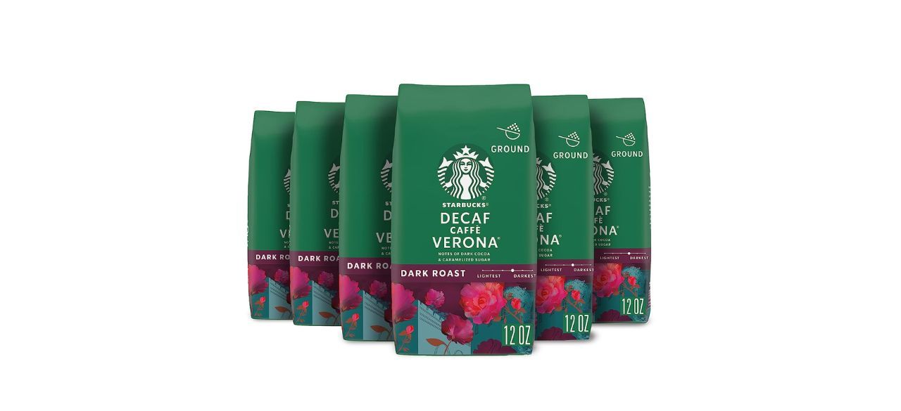 A set of 6 bags of Starbucks Decaf Caffe Verona dark roast coffee. The bags are green with pink roses on them.