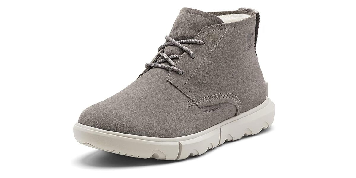 a gray stylish snowboot on a white background