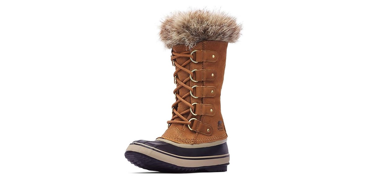 women's snow boot with faux fur top on white background