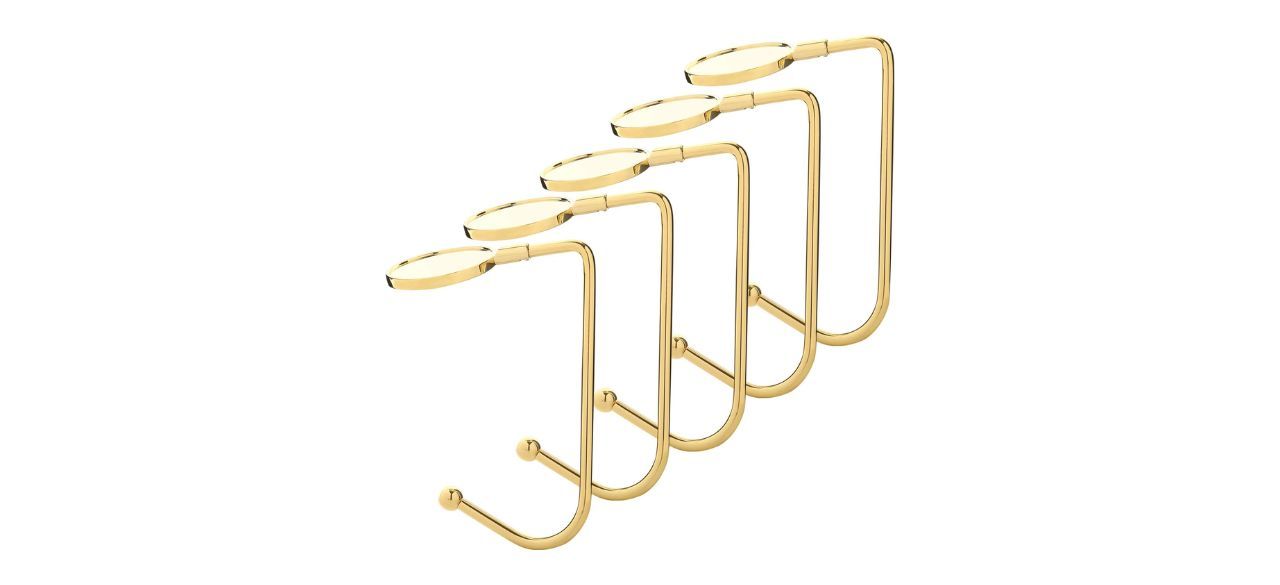 gold Christmas stocking hooks with a gold circle at the top of each one