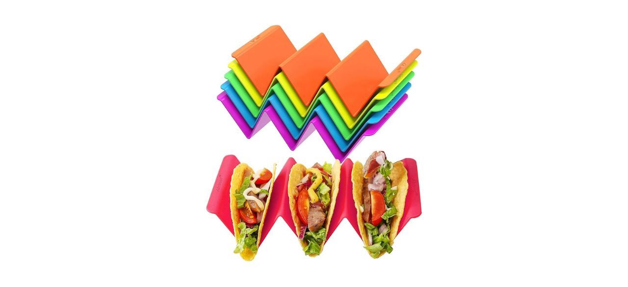 Six colorful taco holders with three tacos