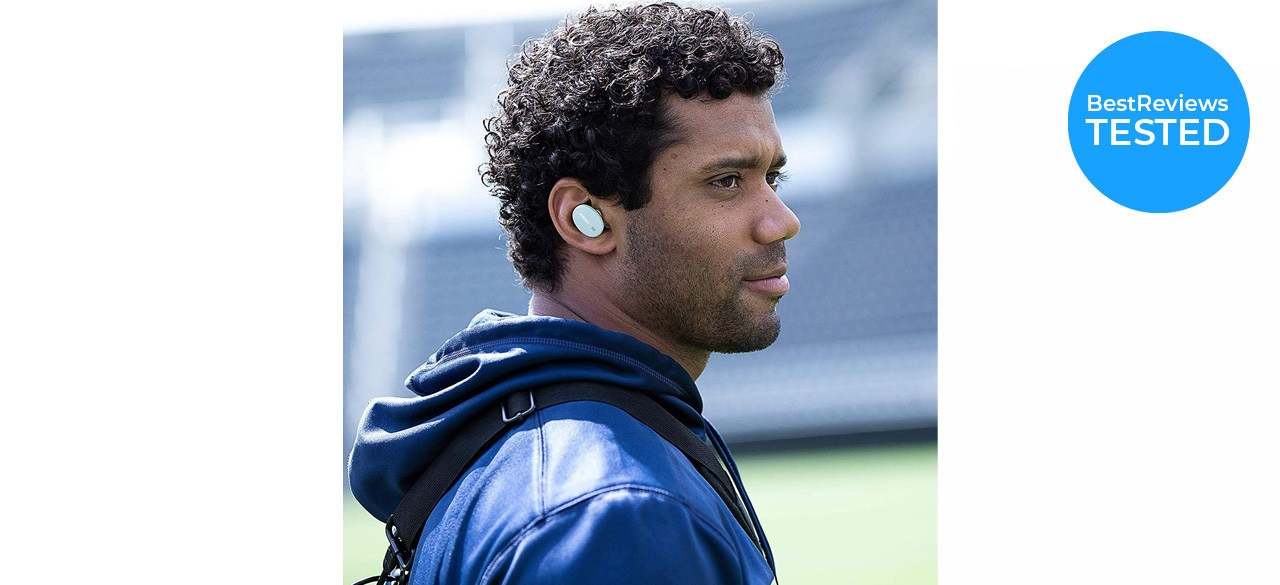 Man wearing Bose Sport Earbuds outdoors