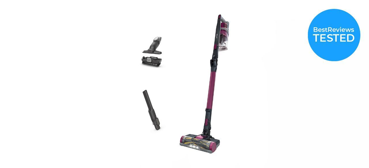 a pink Shark Pet Plus Cordless Stick Vacuum with attachments