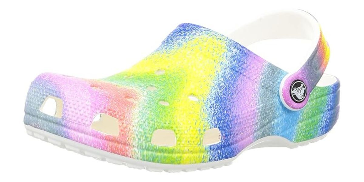 rainbow foam clogs with a strap on the back 