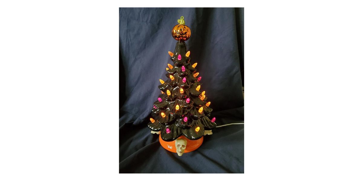 black halloween tree with orange lights