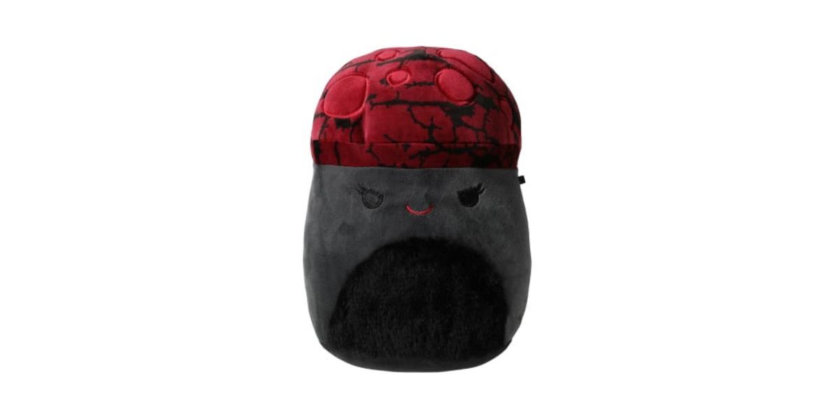 black and red plush toy on white background