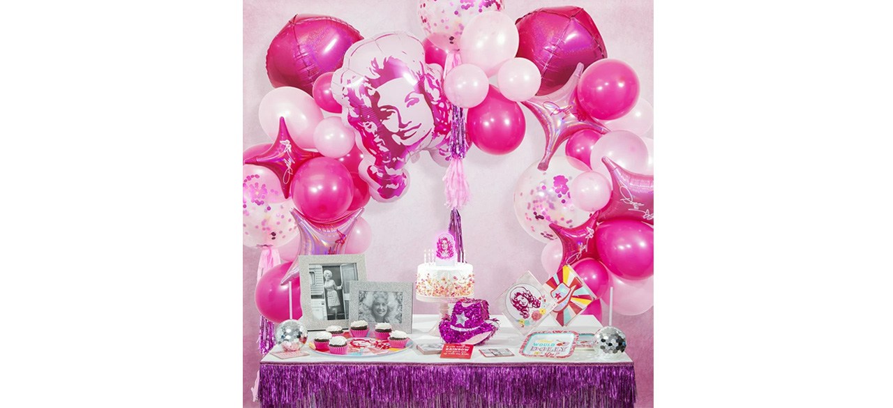 Dolly Parton Pink Party Balloon Arch over party table